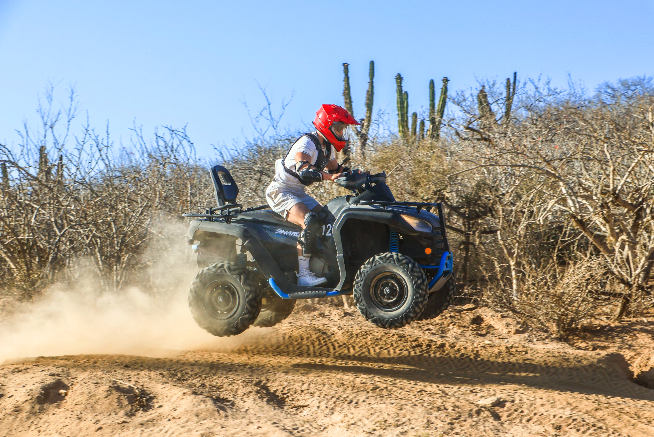 Client enjoying an ATV tour by Cabo Adventures