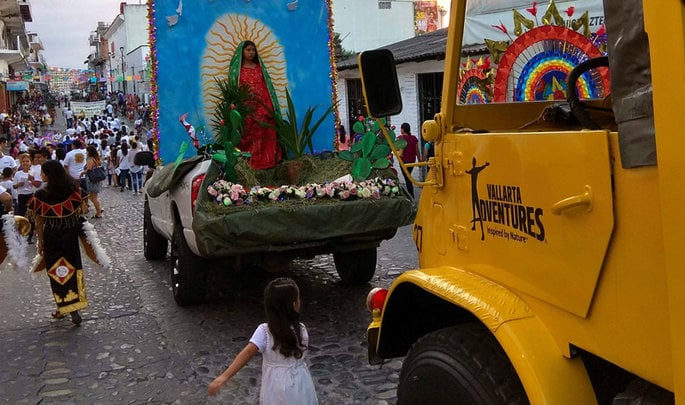 Virgen de Guadalupe statute on a truck