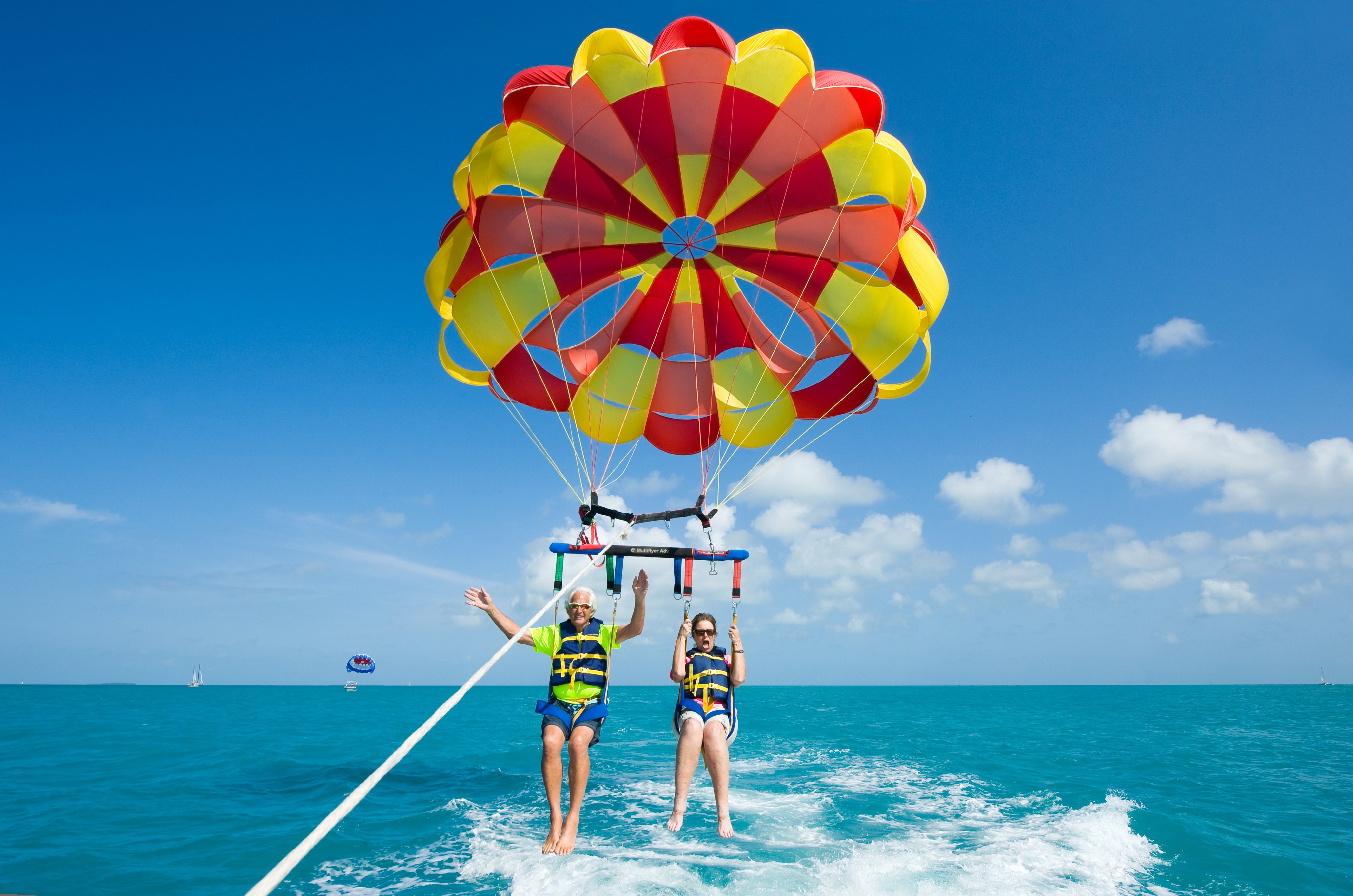 two people parasailing in puerto vallarta