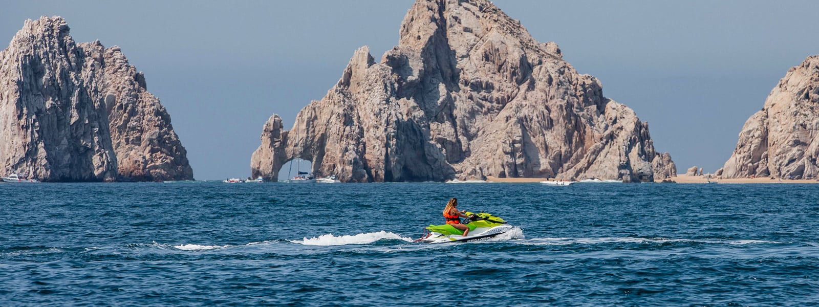 pass by the arch of cabo san lucas on your jet ski with cabo adventures