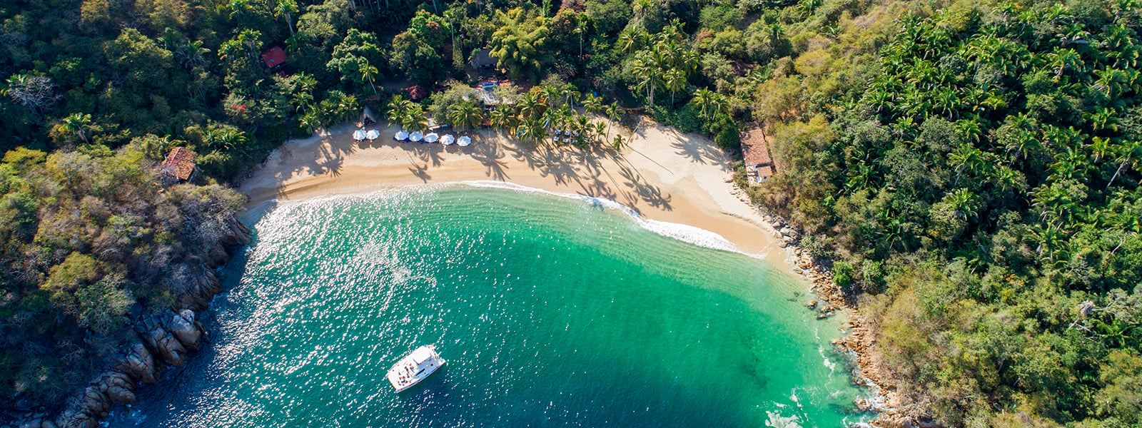 Yacht sailing along Puerto Vallarta's coastline