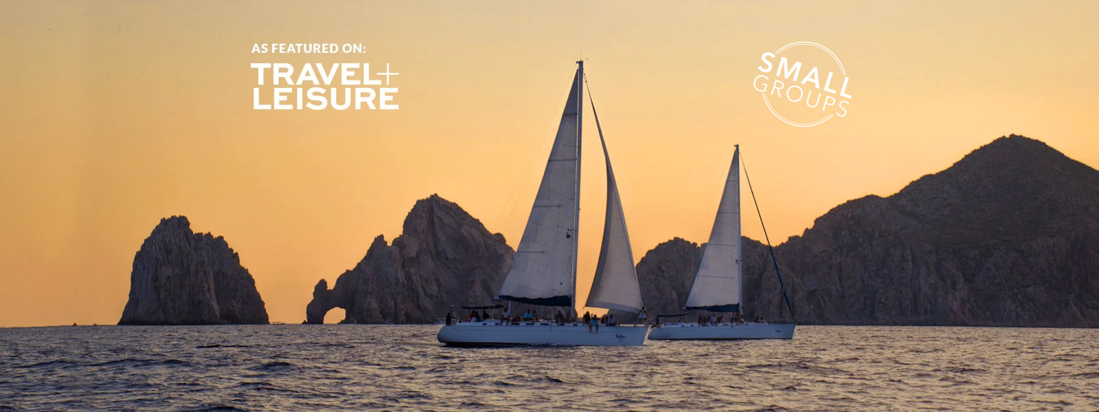 luxury sail boats at sunset in cabo