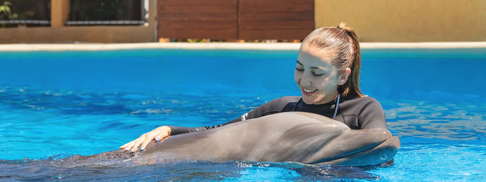 Dolphin kiss photo in Puerto Vallarta | Dolphin Adventure