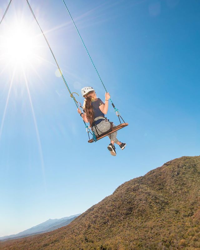 woman swinging on cabo adventures highest outdoor swing