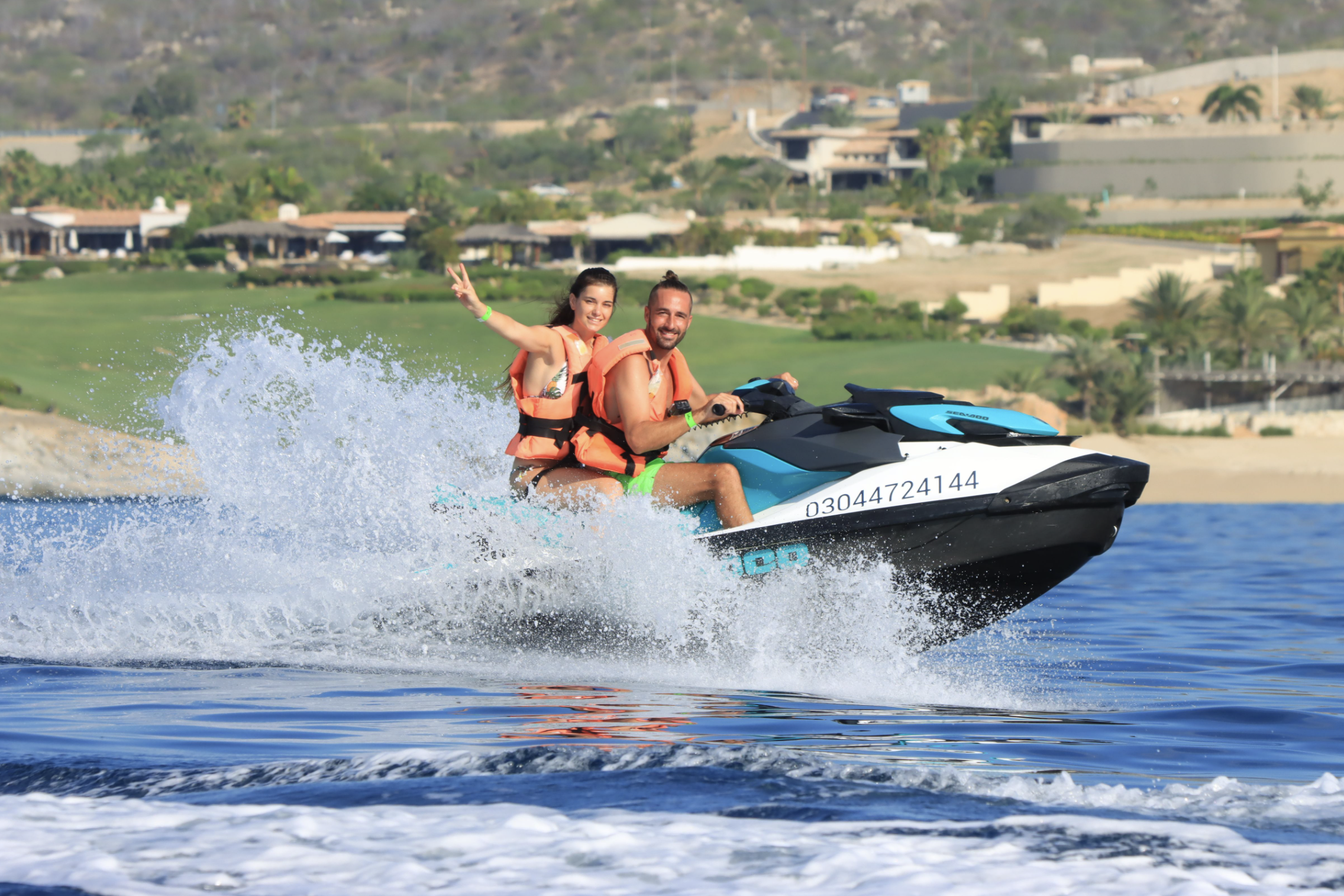 Couple on a jetski in Cabo San Lucas with Cabo Adventures