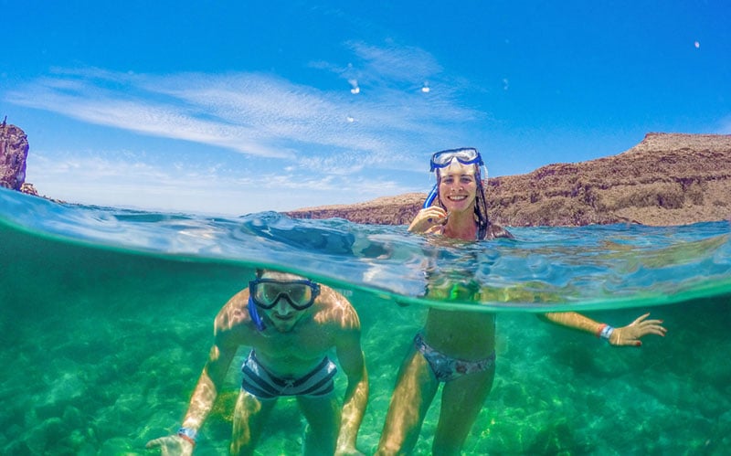 Couple snorkeling in Sea of Cortez on Honeymoon with Cabo Adventures