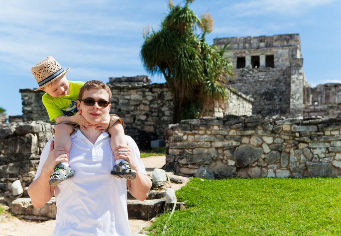 Father and son touring the Ruins at Tulum