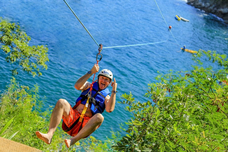 Man ziplining in puerto vallarta at the teen adventure cove