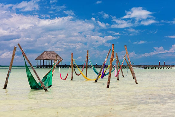 What is unique about Holbox & why do people love it?