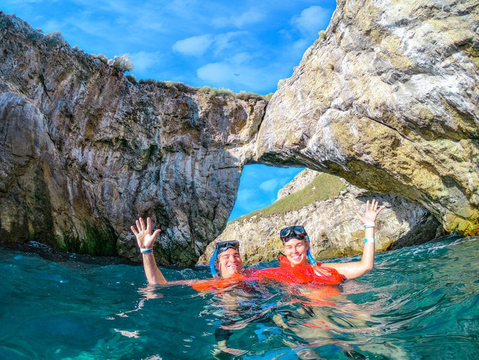 A couple on a snorkeling tour in Puerto Vallarta at Isla Marietas
