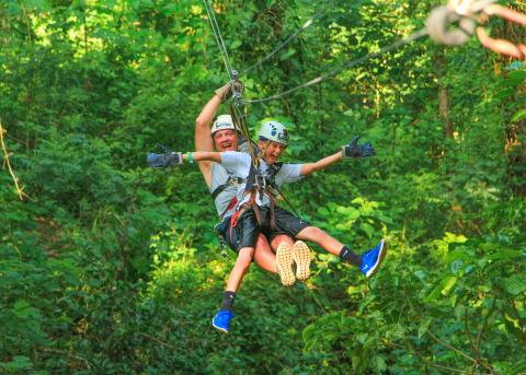 Father and son zip lining together in Puerto Vallarta