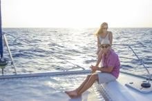 Couple vacationing in cancun on a boat