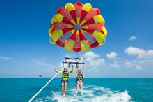 two people parasailing in puerto vallarta