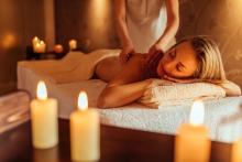 woman getting a massage at a cabo resort she isn't staying at