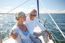 senior couple sailing in cabo mexico